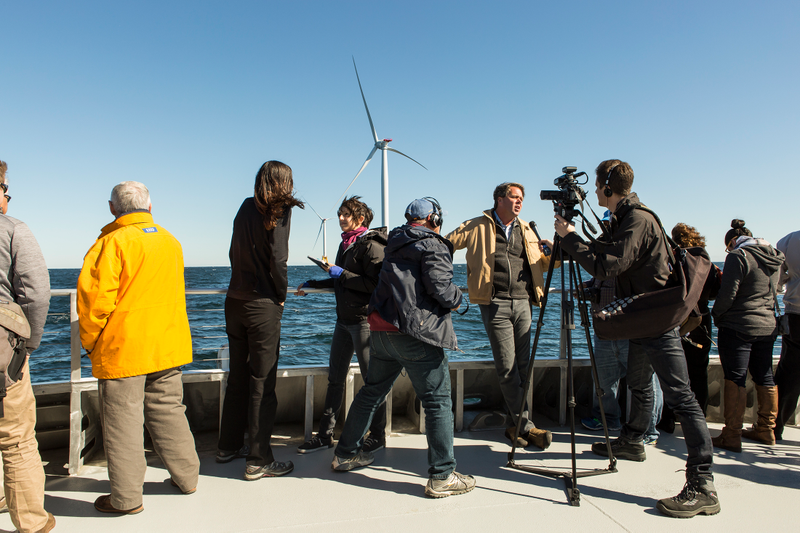 Deepwater wind executives, labor leaders and environmentalists speak to reporters on a recent tour of the Block Island Wind Farm. Photo: Jesse Burke for Gizmodo